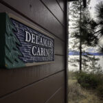 Galilee Delamar Cabin sign and lake view